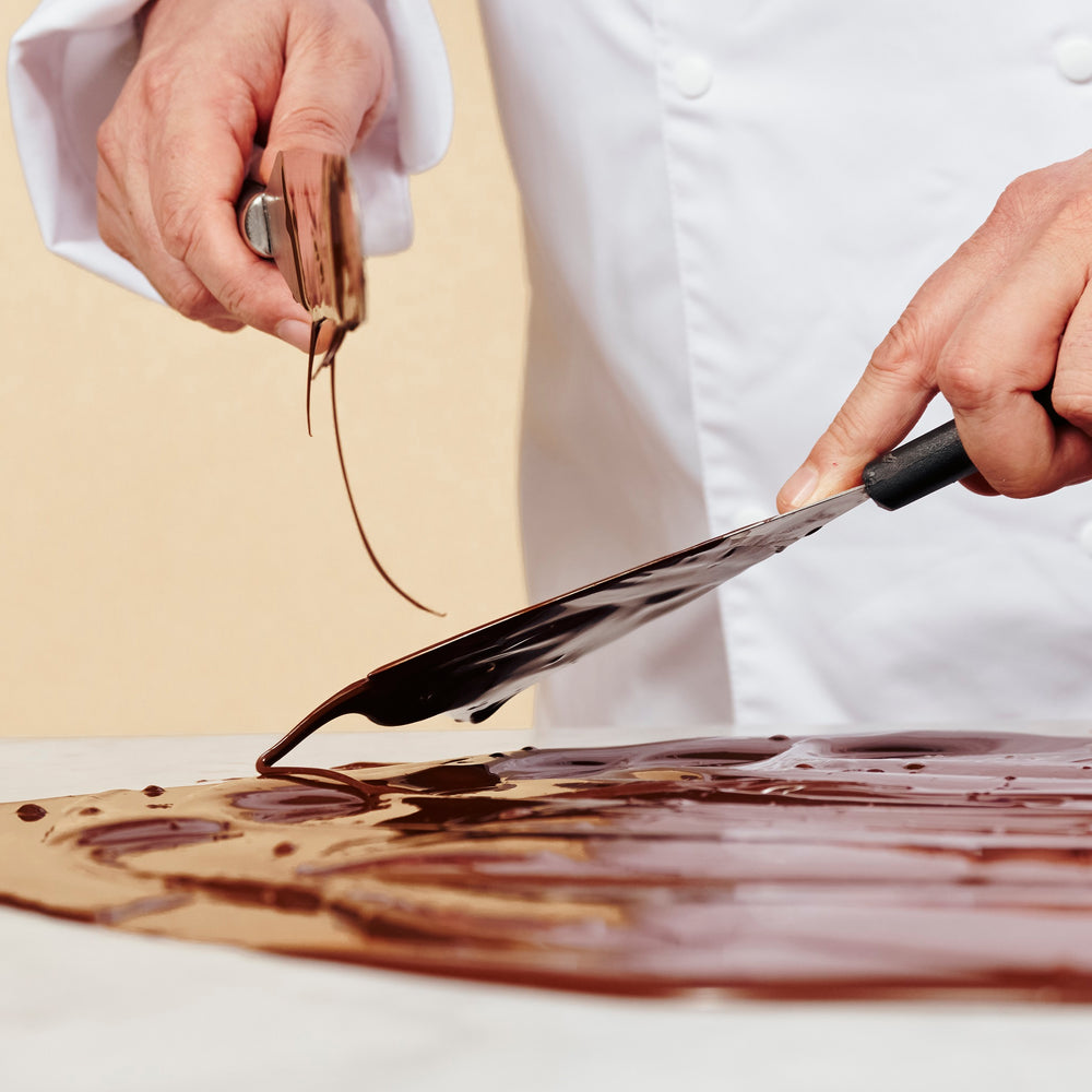 Leonidas maitre chocolatier making chocolate