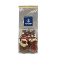 Belgian chocolate Santas and snowmen in festive packaging, handmade pralines for holiday gifting